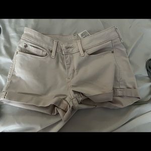 Levi’s shorts. Have a tinted pink color to them